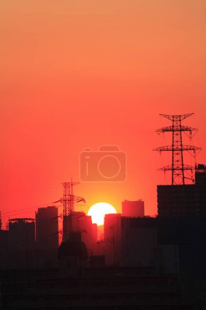 Photo for Beautiful sunset sky over the city skyline - Royalty Free Image
