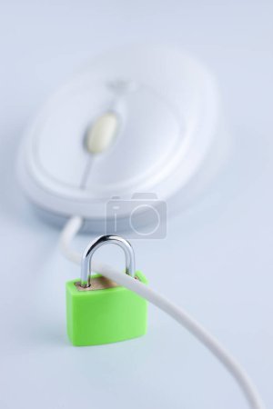 White computer mouse with padlock, online security concept