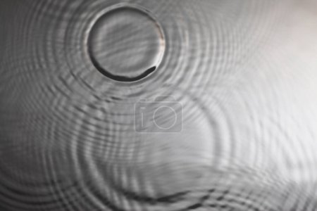 Photo for Drop traces on liquid surface. droplets ripple. abstract background - Royalty Free Image