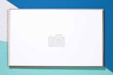top view of  notepad page  on abstract  background