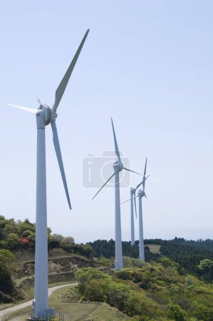 Photo for Wind turbines on hill. Renewable energy concept - Royalty Free Image