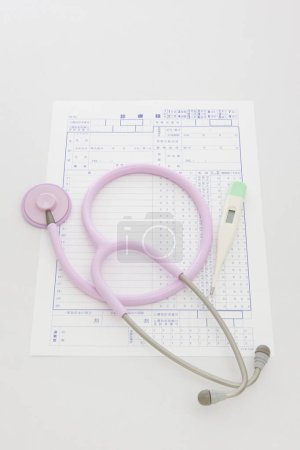 Medical Record And Pink Stethoscope
