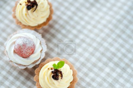 Photo for Group of fancy cup cakes, birthday cupcakes celebration concept, copy space - Royalty Free Image