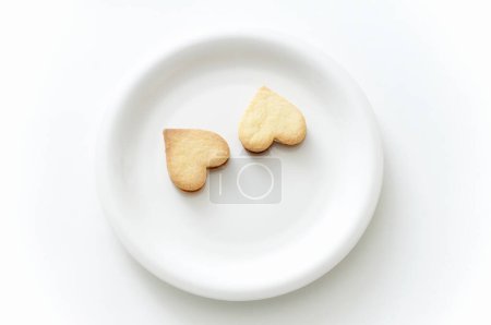 Téléchargez les photos : Vue rapprochée de délicieux biscuits en forme de coeur sucré - en image libre de droit