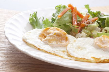 Photo for Fried eggs with vegetables - Royalty Free Image