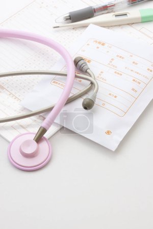 Photo for Medical Record And Pink Stethoscope - Royalty Free Image