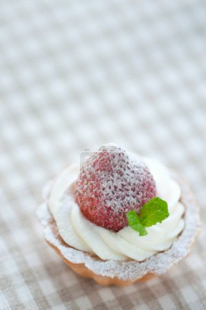 Photo for Delicious cupcake with whipped cream and strawberry - Royalty Free Image