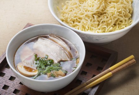 Photo for Top view of Japanese Ramen dish made with pork bone broth and noodles - Royalty Free Image
