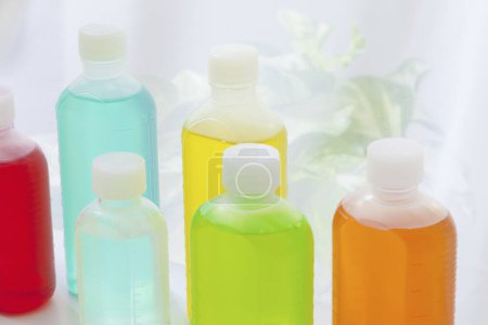 Photo for Bottles with body care products on background, close up - Royalty Free Image
