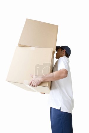 Photo for Delivery man with  cardboard boxes on white background - Royalty Free Image