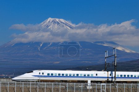 Photo for View of Mt Fuji  and fast shinkansen Bullet Train speeding in  Japan. - Royalty Free Image