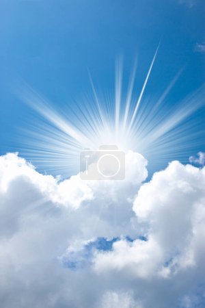 Photo for Bright sun with white clouds on blue background. - Royalty Free Image