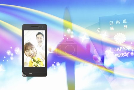 Photo for Portrait of beautiful married japanese couple on the smartphone screen - Royalty Free Image