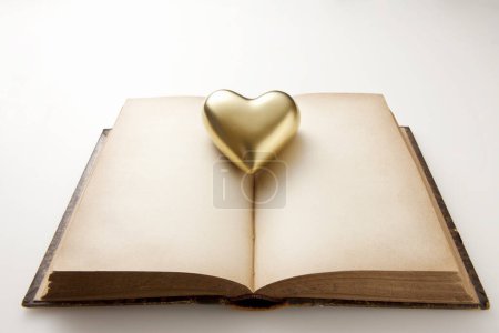Photo for Open book with heart on pages on white background, top view - Royalty Free Image