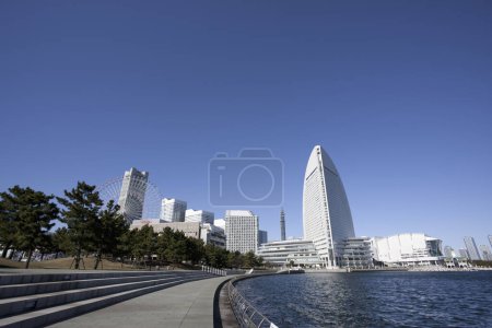 Photo for Modern city buildings over blue sky background in Yokohama, Japan - Royalty Free Image