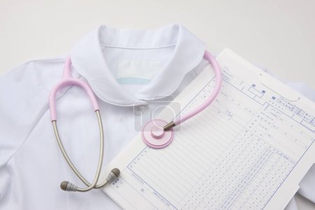 Medical Record And Pink Stethoscope