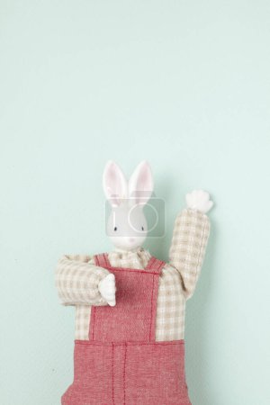 Photo for Rabbit toy on blue background - Royalty Free Image