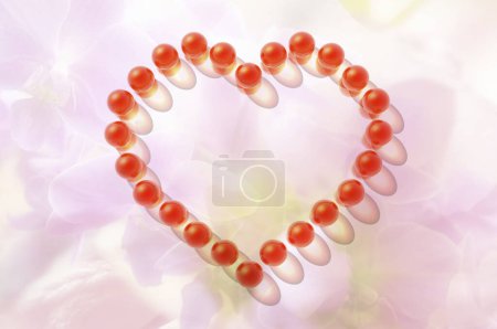 Photo for Red heart shaped pearl necklace on color pink background - Royalty Free Image