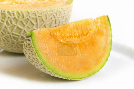 Photo for Close-up view of fresh organic melon on white background. - Royalty Free Image