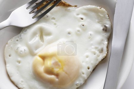 Photo for Fresh fried egg close up background view - Royalty Free Image