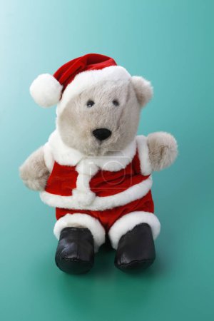 Photo for Christmas teddy bear wearing santa claus costume - Royalty Free Image