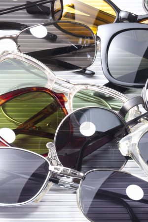 Photo for Beautiful sunglasses isolated on background, close up - Royalty Free Image