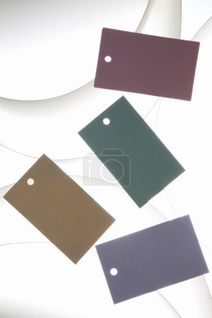 Photo for Close-up view of blank paper note tags on light background - Royalty Free Image