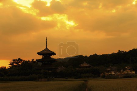Photo for Silhouette of the temple in the sunset at Japan - Royalty Free Image
