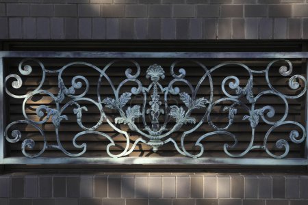 Photo for Metal ornament with a decorative pattern of a brick fence - Royalty Free Image