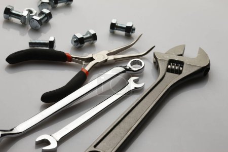 Photo for Different metal tools on grey background - Royalty Free Image