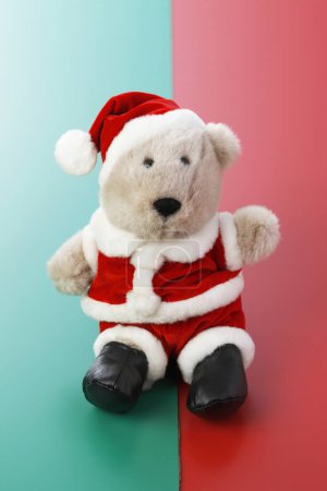 Photo for Christmas teddy bear wearing santa claus costume - Royalty Free Image