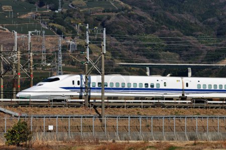 Photo for Fast shinkansen Bullet Train speeding in  Japan. - Royalty Free Image