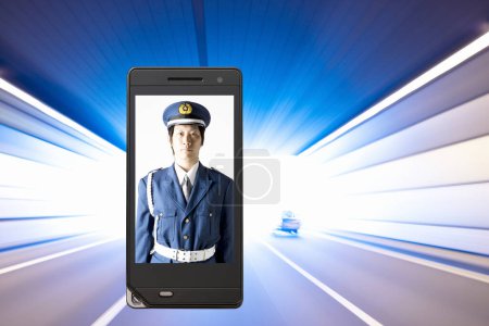Photo for Phone screen with portrait of japanese polcie offier - Royalty Free Image
