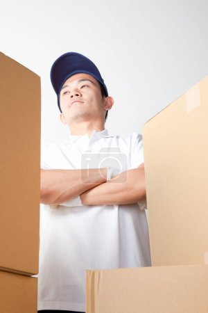Photo for Delivery man with cardboard boxes - Royalty Free Image