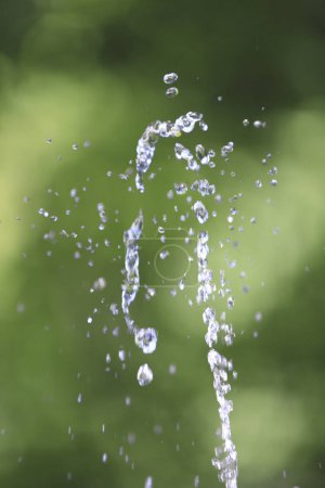 Photo for Water drops in air, blurred background. Abstract background - Royalty Free Image