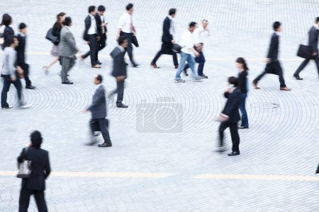 Photo for Group of people walking in city at daytime - Royalty Free Image
