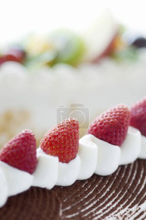 Photo for Delicious cake with strawberries on  background - Royalty Free Image