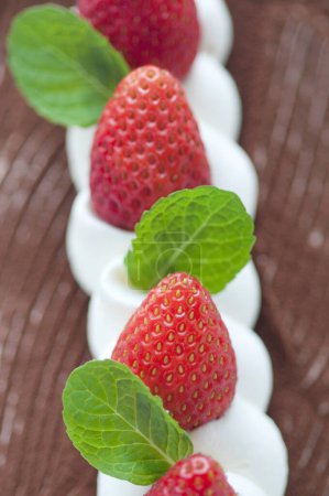 Photo for Delicious cake with strawberries on  background - Royalty Free Image
