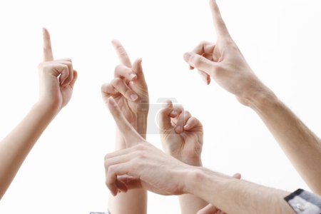 Foto de Grupo de manos haciendo gestos sobre fondo blanco - Imagen libre de derechos