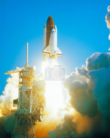 Photo for Space rocket flying over blue sky. - Royalty Free Image