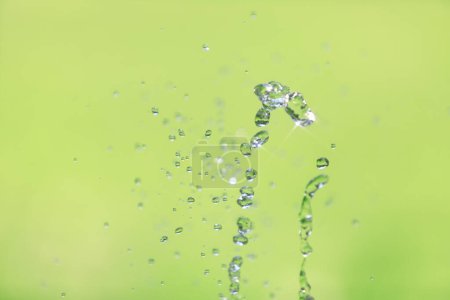 Photo for Water drops in air, blurred background. Abstract background - Royalty Free Image