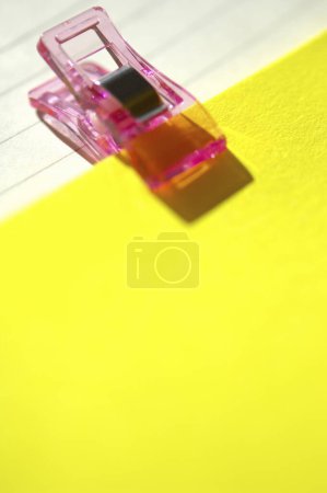 Photo for Close up pink paper clip - Royalty Free Image