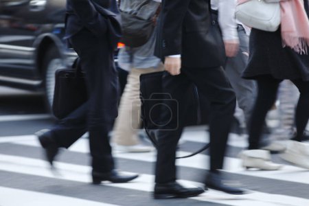 Photo for Crowd walking by central street in Tokyo city, Japan - Royalty Free Image