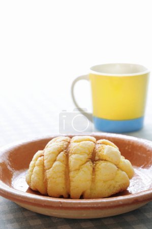Japanese sweet bread " Melon Pan" and tea