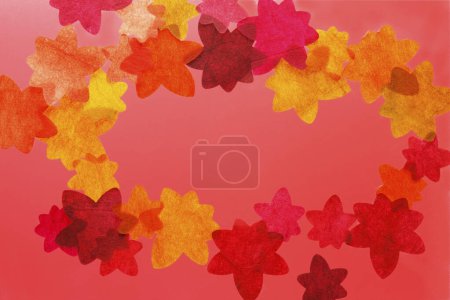 Colorido fondo otoñal con hojas de otoño cortadas en papel 
