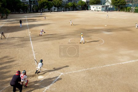 Photo for Japanese children playing baseball, Little League concept - Royalty Free Image