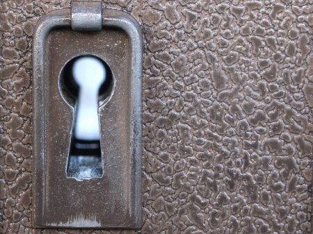 Photo for A vertical shot of a door lock on background, close up - Royalty Free Image