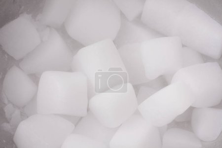 Dry ice cubes on background, close up
