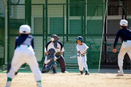 Photo for Japanese children playing baseball, Little League concept - Royalty Free Image