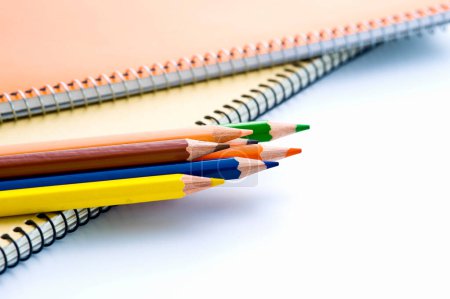 Photo for School supplies, notebooks and pencils on background, close up - Royalty Free Image